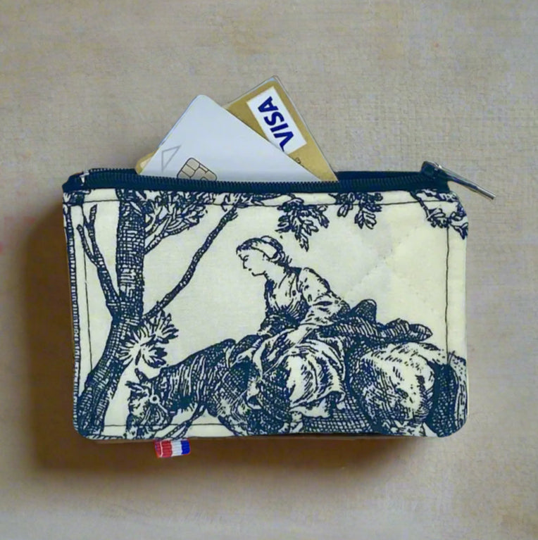 Vue latérale du porte-cartes en tissu patrimonial avec fermeture